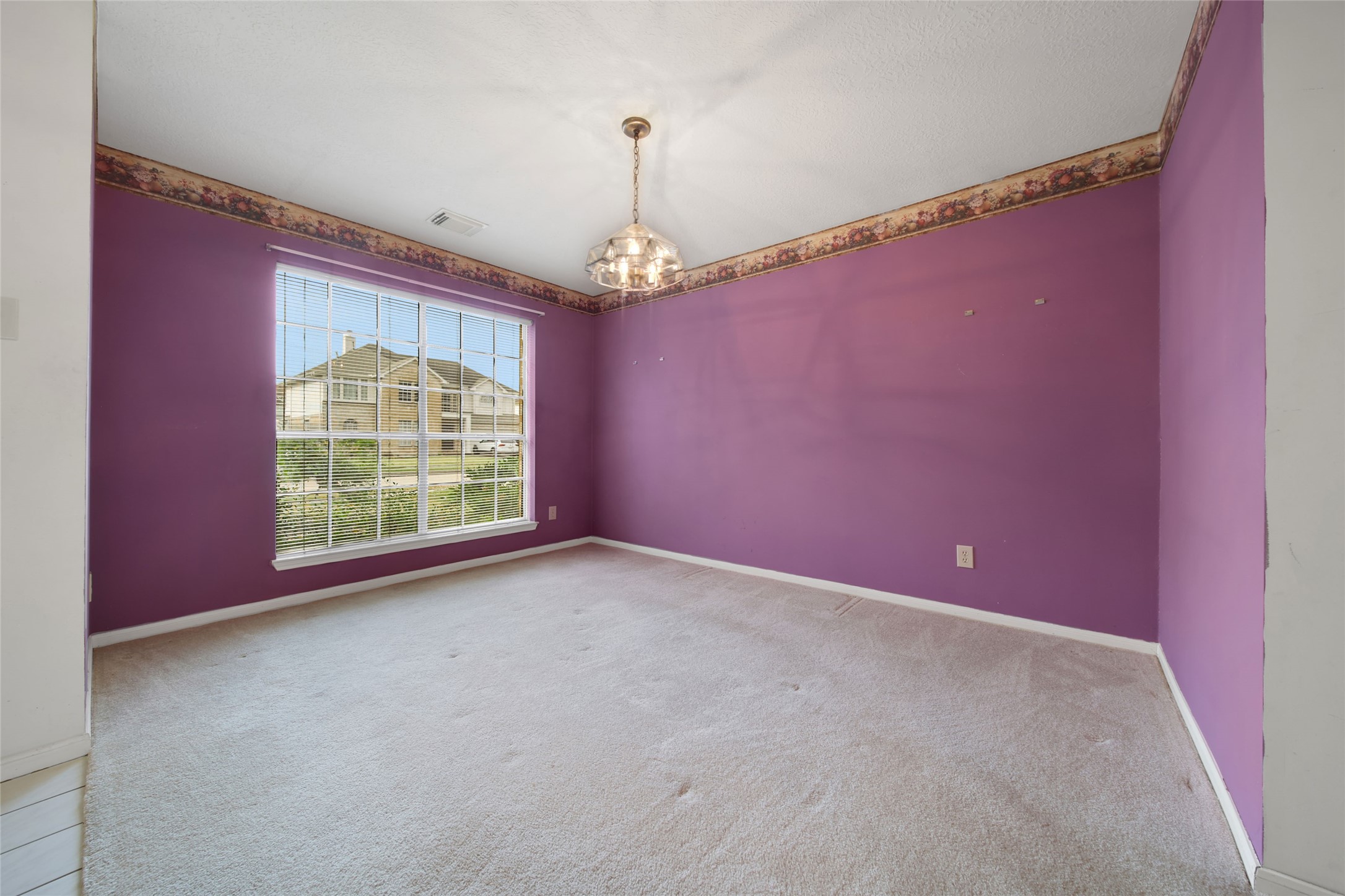 19110 Timber Way Drive Humble, TX 77346 - Photo 11 of 24 a view of an empty room with a window