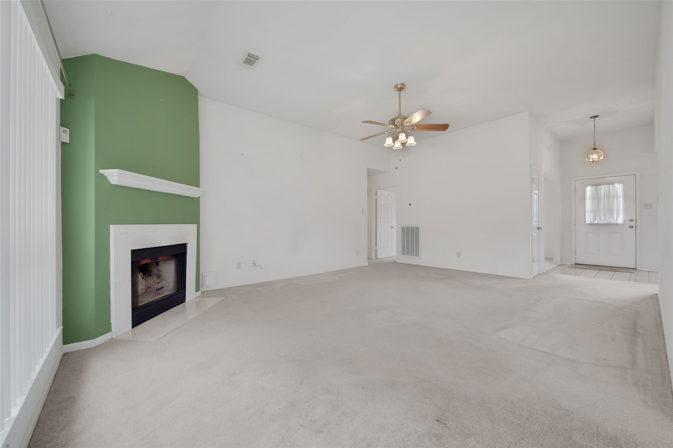 19110 Timber Way Drive Humble, TX 77346 - Photo 9 of 24 a view of a livingroom with a fireplace