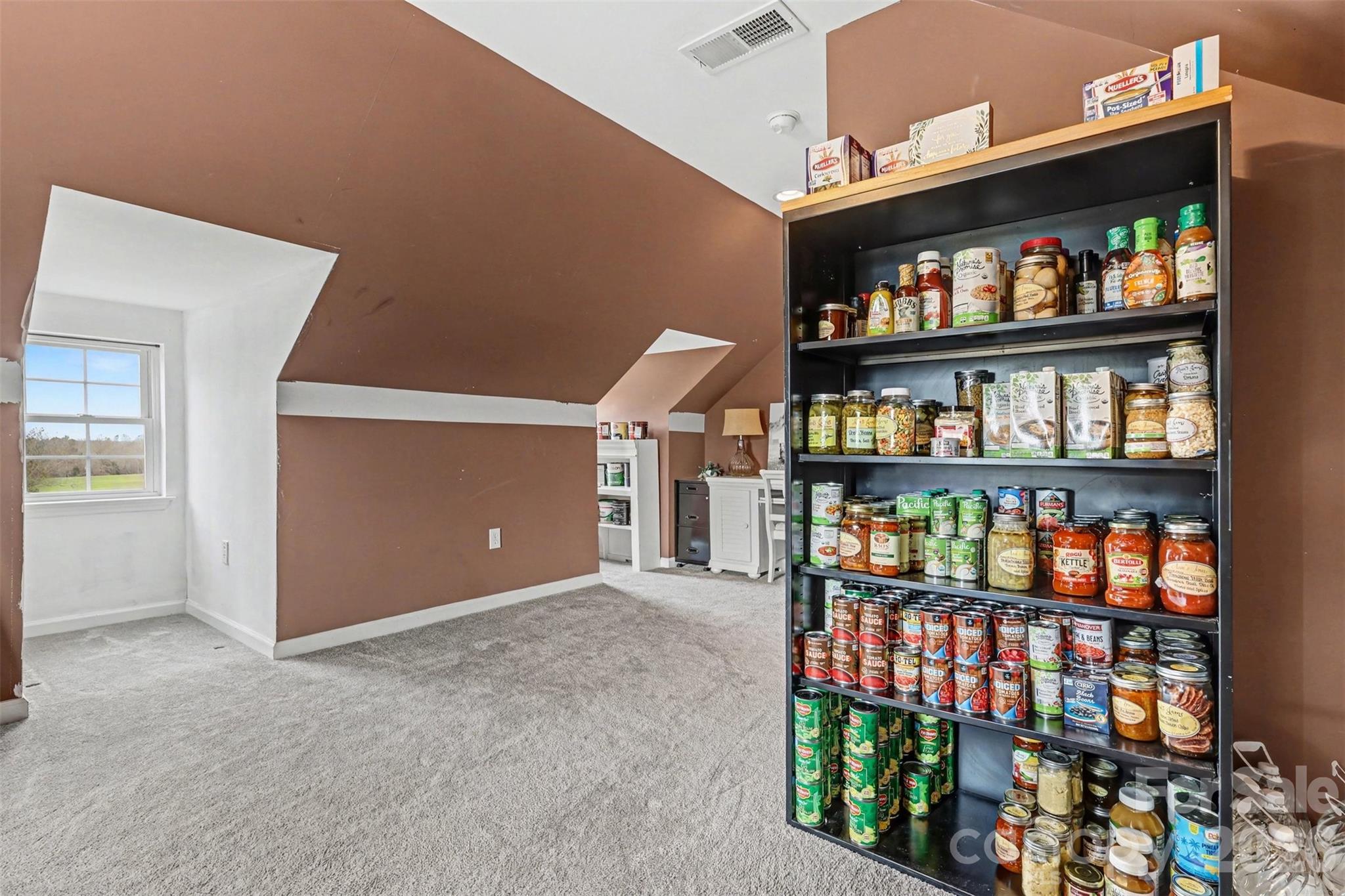 2262 Center Road Chester, SC 29706 - Photo 17 of 31 a view of an empty room with a book shelf
