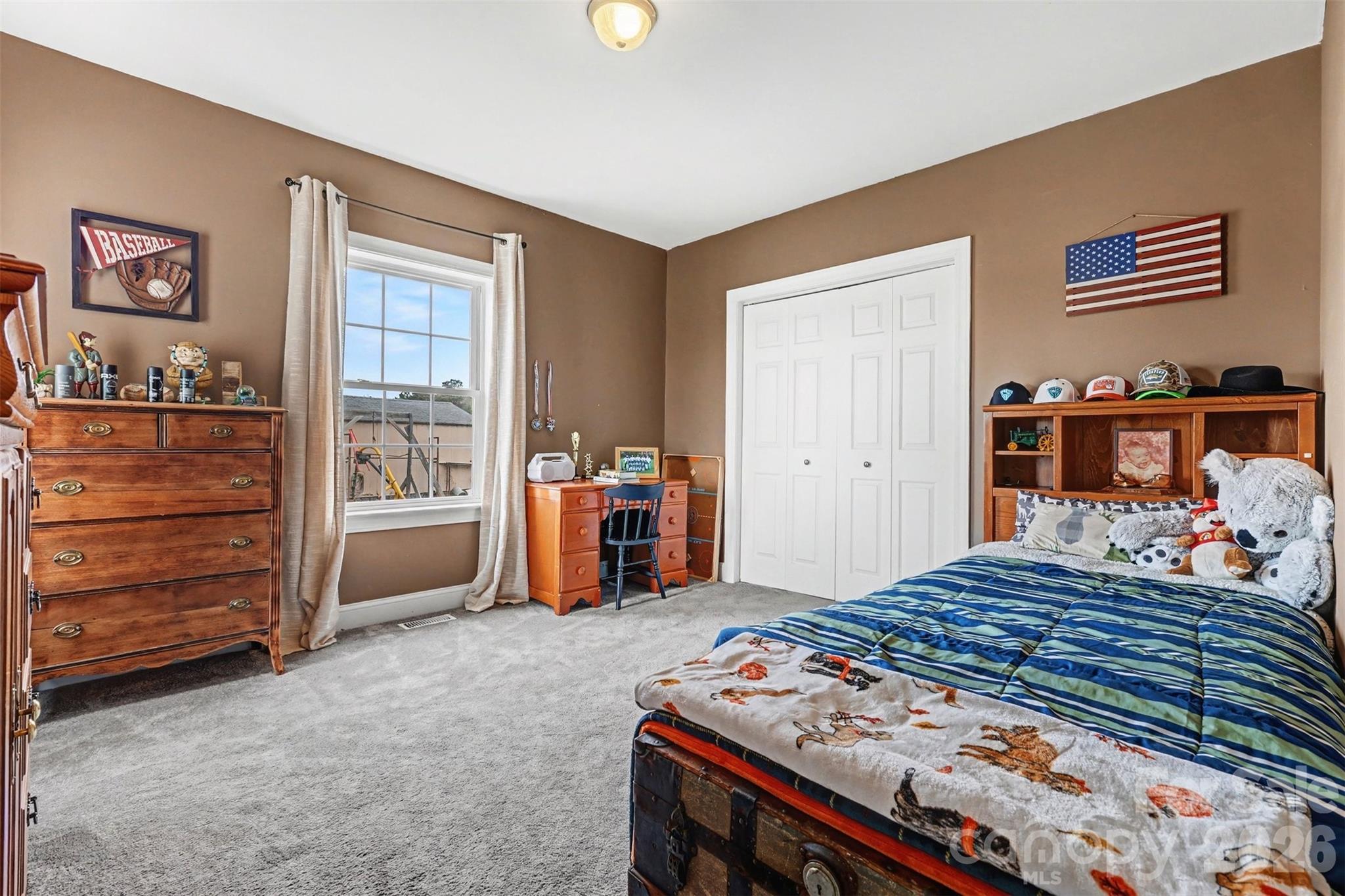 2262 Center Road Chester, SC 29706 - Photo 23 of 31 a bedroom with a bed and a dresser