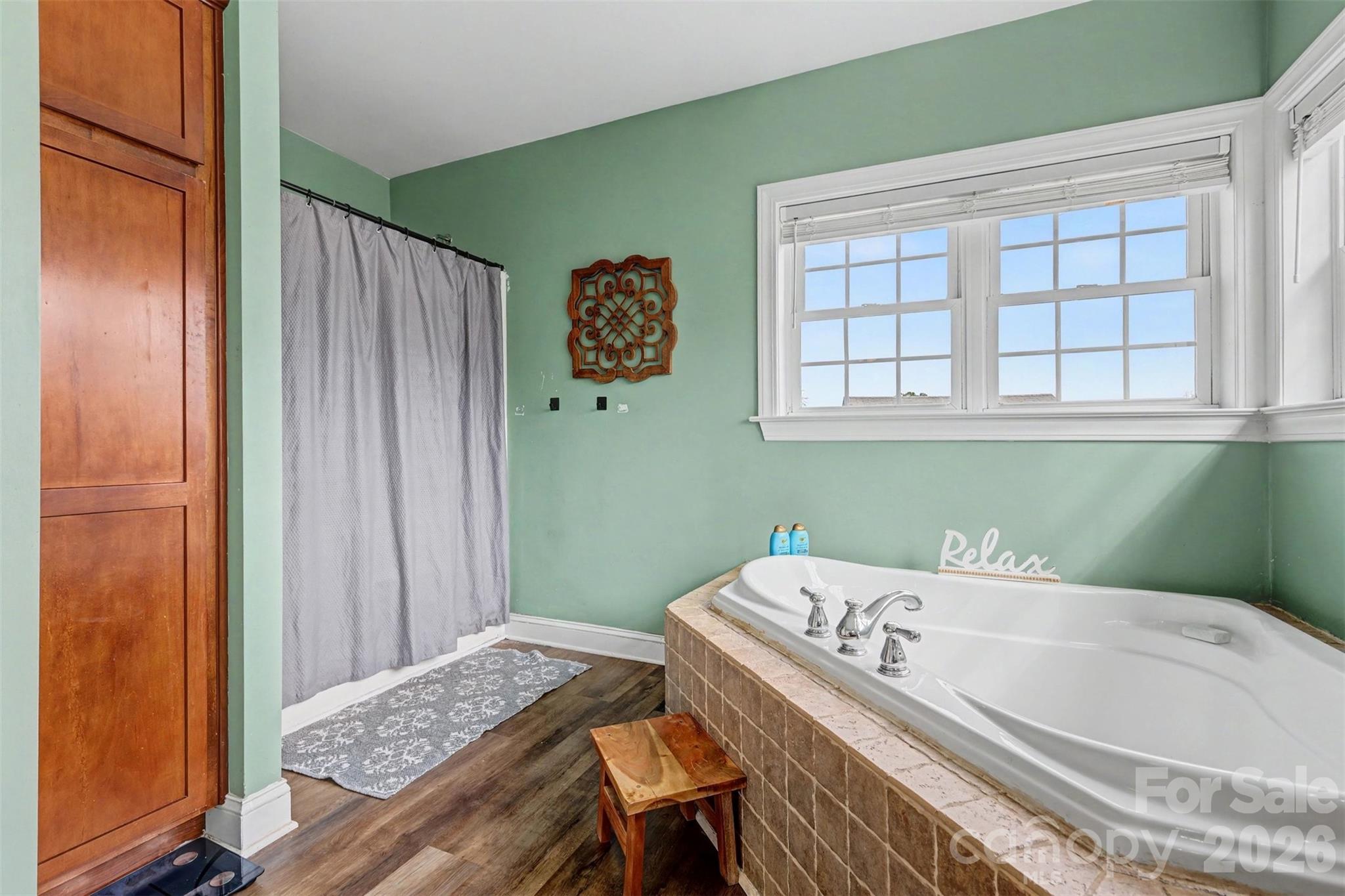 2262 Center Road Chester, SC 29706 - Photo 27 of 31 a bathroom with a tub and a window