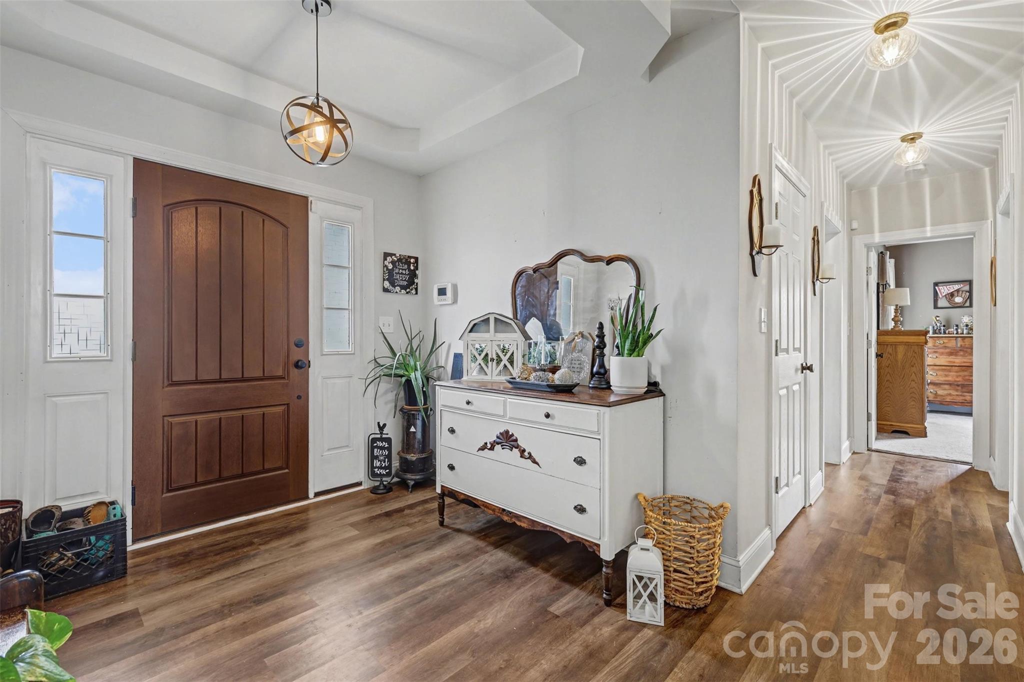 2262 Center Road Chester, SC 29706 - Photo 4 of 31 a living room with furniture and a chandelier
