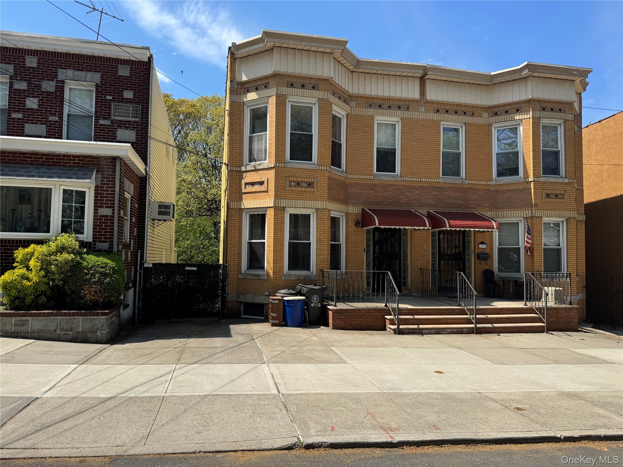 82-72 88th Place Queens, NY 11421 - Photo 2 of 26 a front view of a building