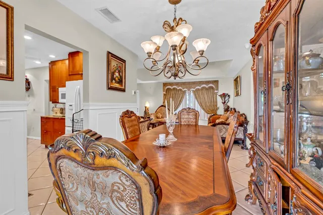 a view of a dining room with furniture