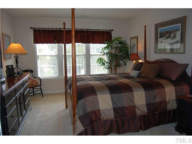 3733 Old Post Road Raleigh, NC 27612 - Photo 13 of 25 BR 2 w/carpet, light, closet, 3 double windows w/wood Plantation blinds & door to Full Bath! Bedroom