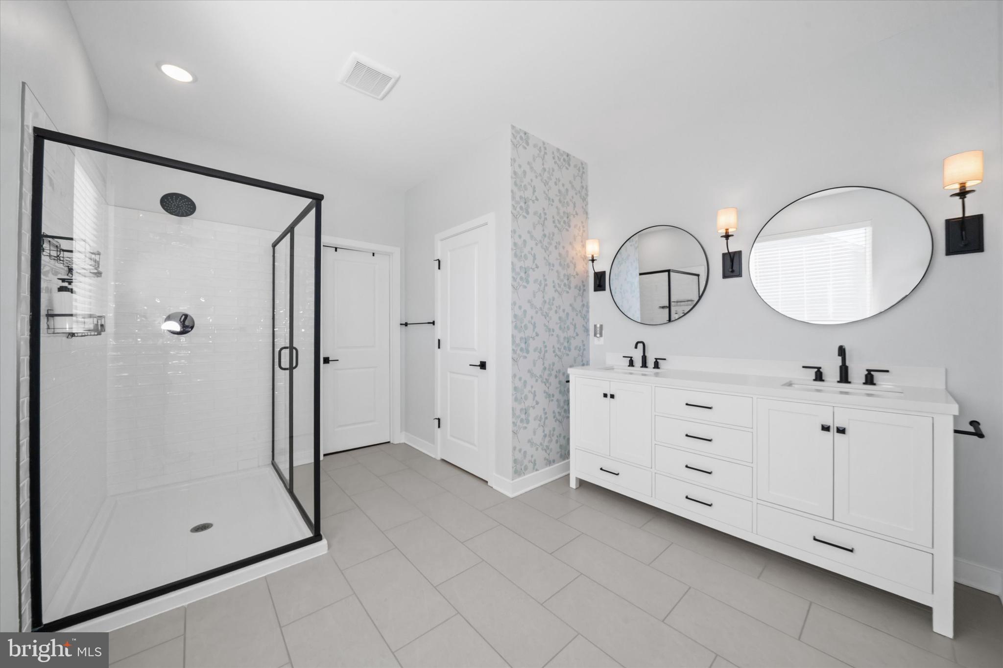 208 South Rdg Brk Drive Felton, DE 19943 - Photo 25 of 44 a bathroom with a double vanity sink mirror and shower