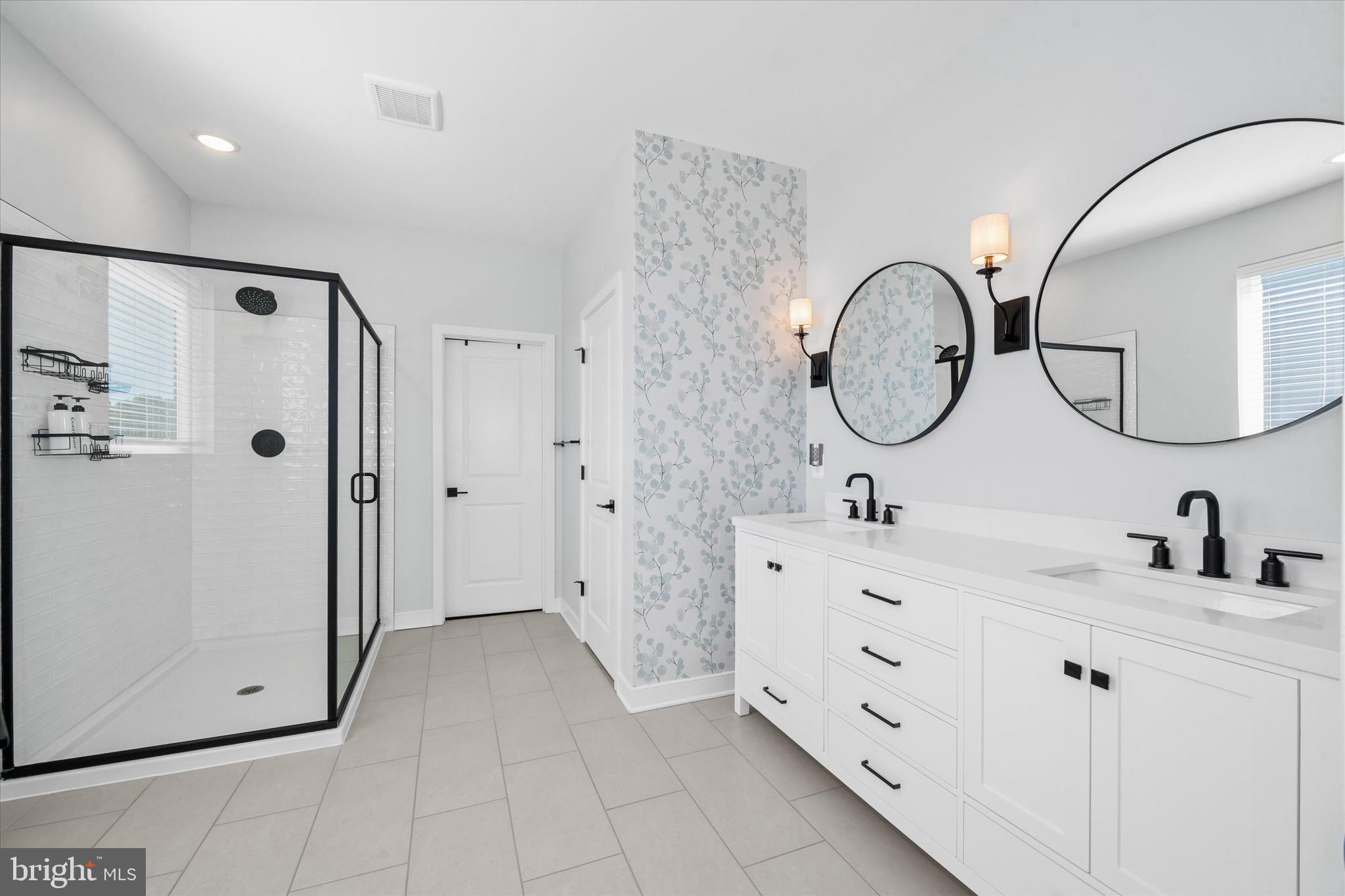 208 South Rdg Brk Drive Felton, DE 19943 - Photo 26 of 44 a bathroom with a double vanity sink mirror and shower