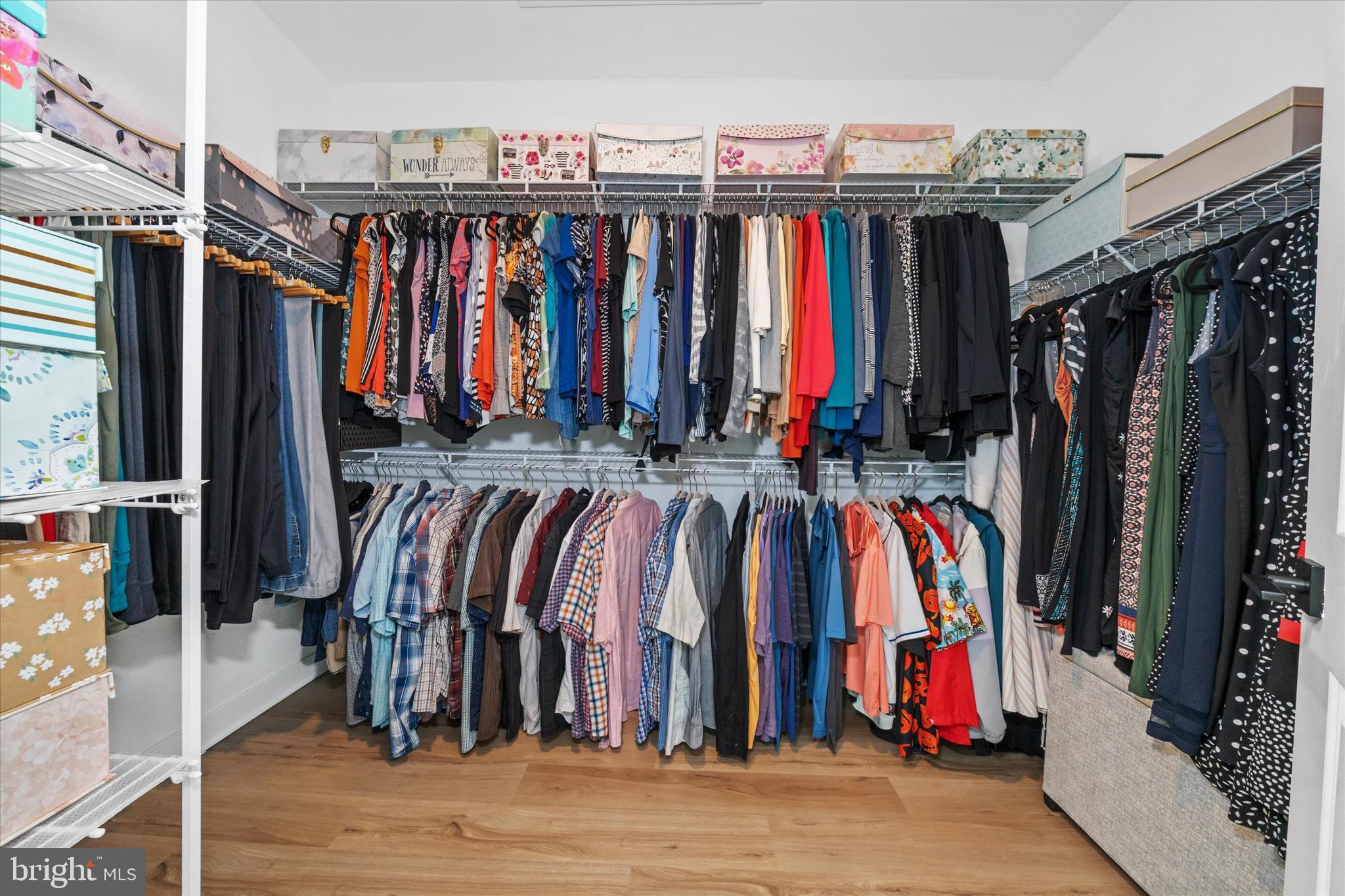 208 South Rdg Brk Drive Felton, DE 19943 - Photo 28 of 44 a view of walk in closet with clothes