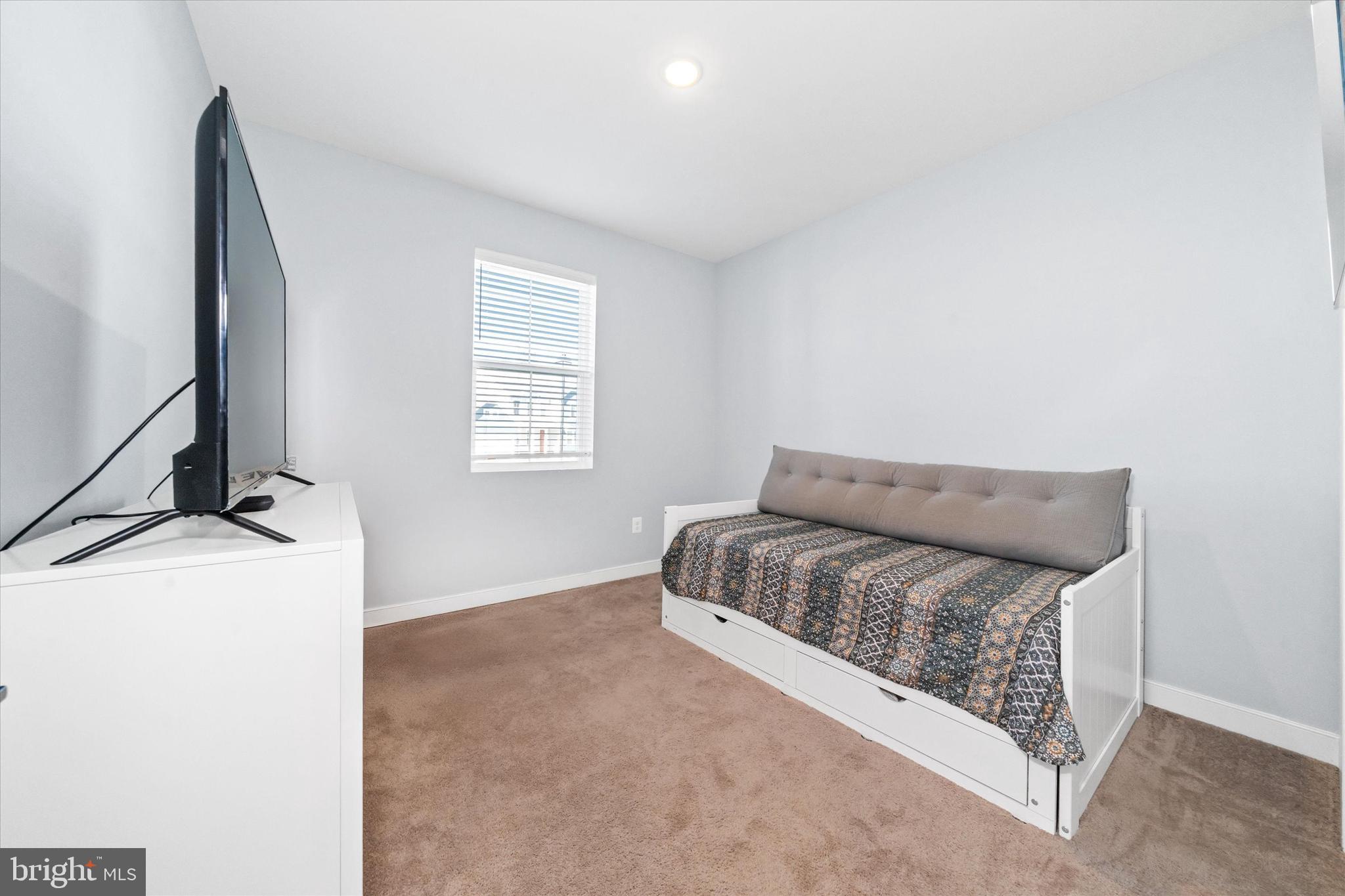 208 South Rdg Brk Drive Felton, DE 19943 - Photo 29 of 44 a living room with furniture and a window