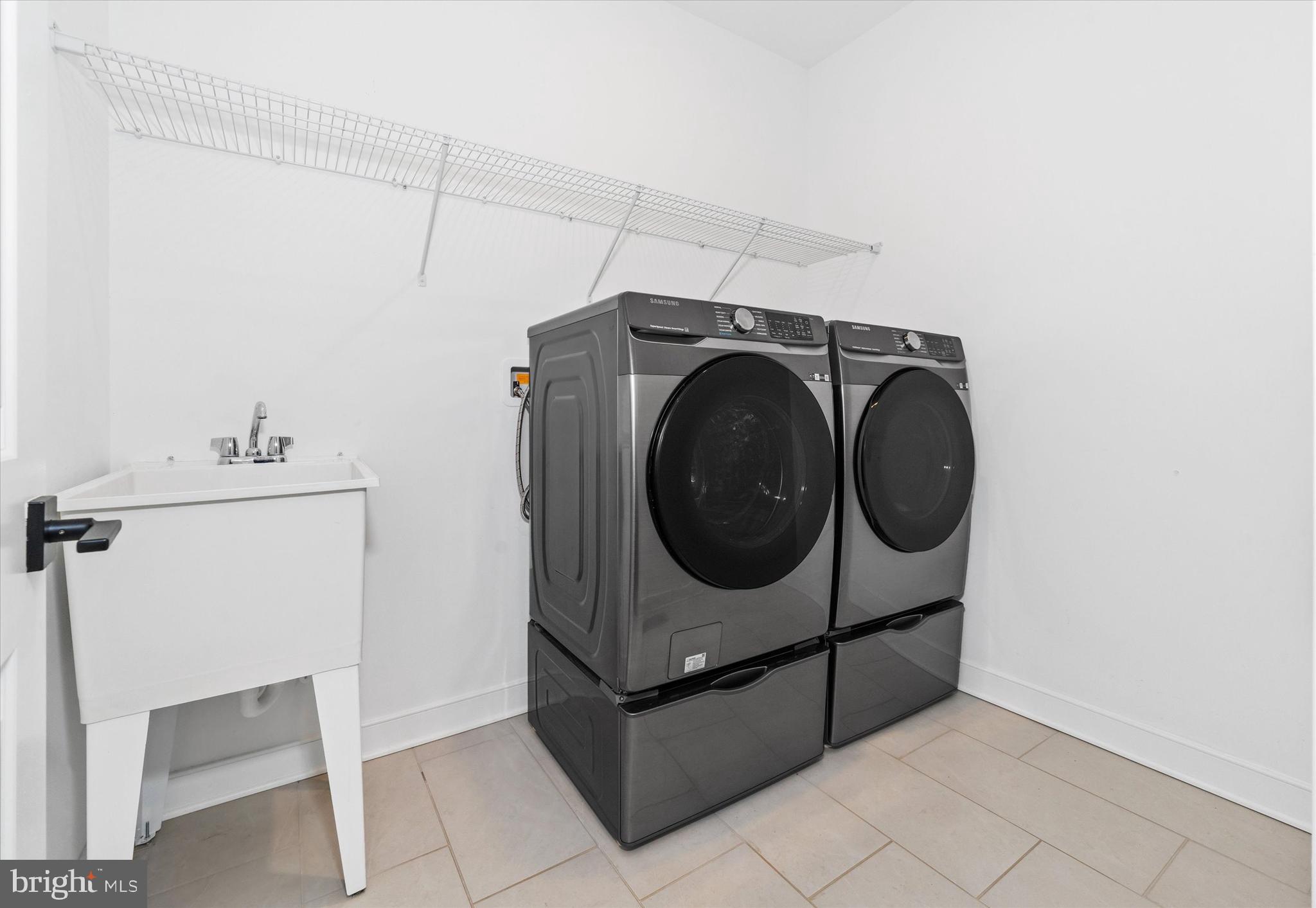 208 South Rdg Brk Drive Felton, DE 19943 - Photo 36 of 44 a utility room with dryer and washer