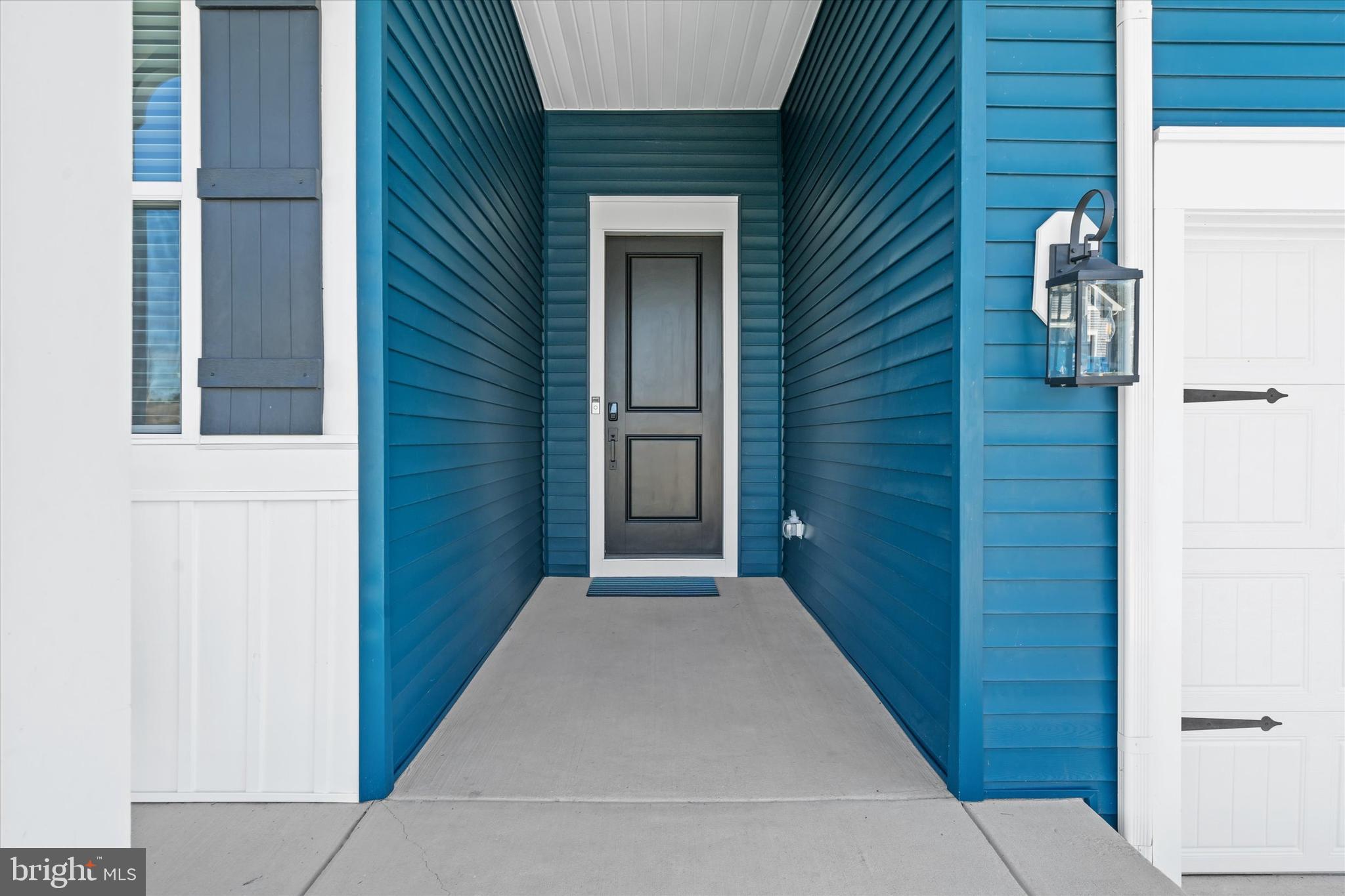 208 South Rdg Brk Drive Felton, DE 19943 - Photo 40 of 44 a view of a hallway with wooden shelves