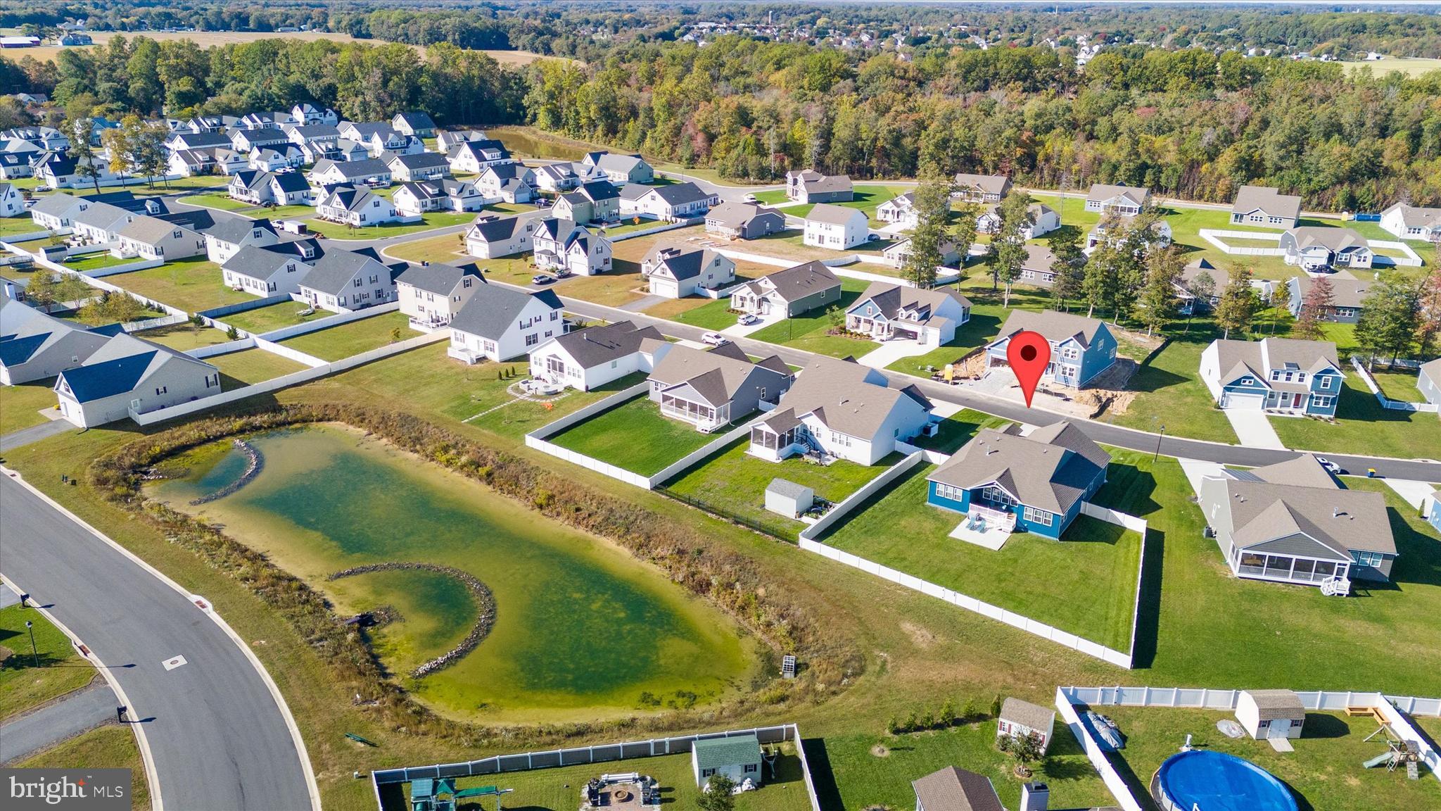 208 South Rdg Brk Drive Felton, DE 19943 - Photo 4 of 44 a view of a swimming pool with outdoor seating