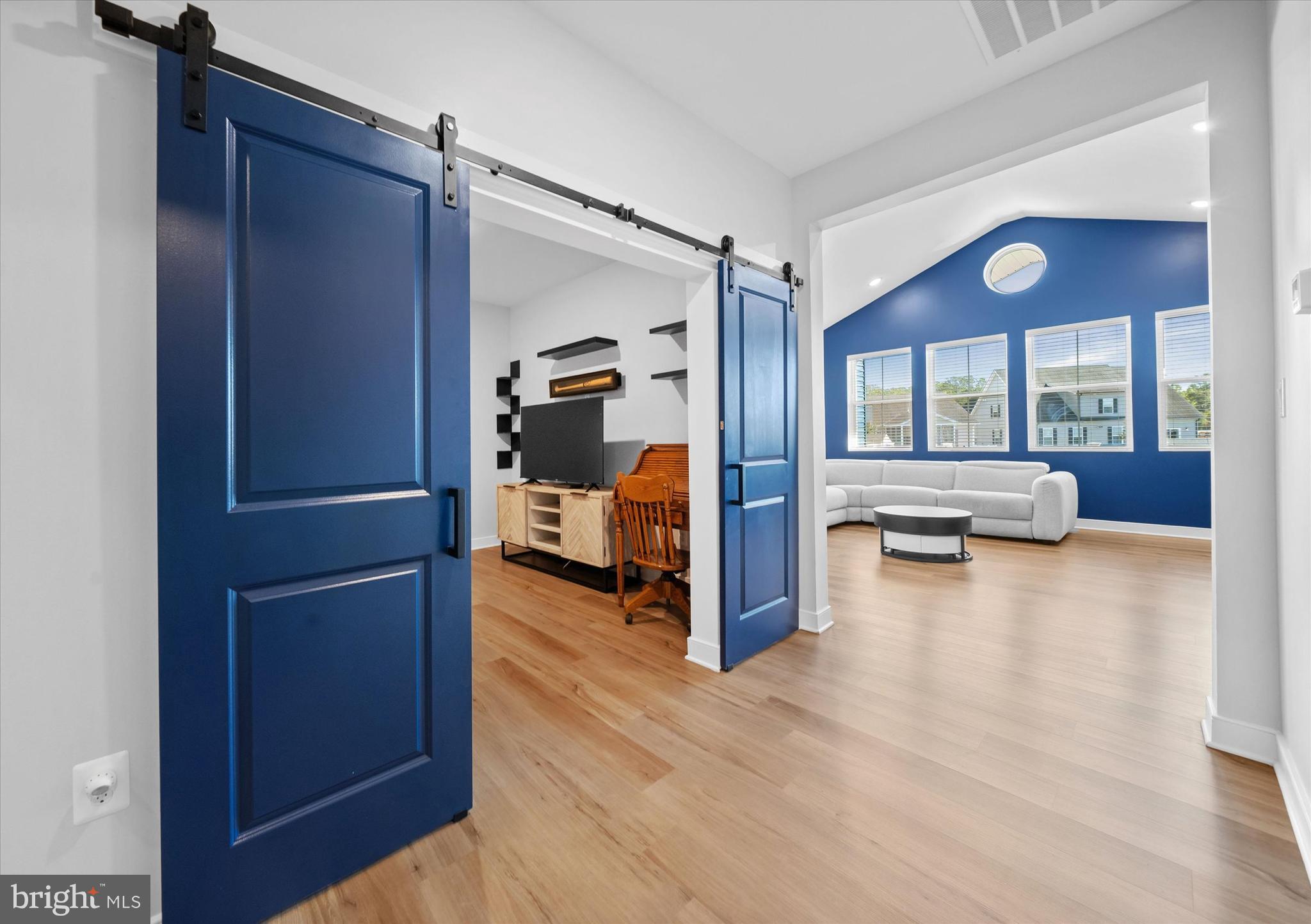208 South Rdg Brk Drive Felton, DE 19943 - Photo 7 of 44 a view of living room with furniture and a walk in closet