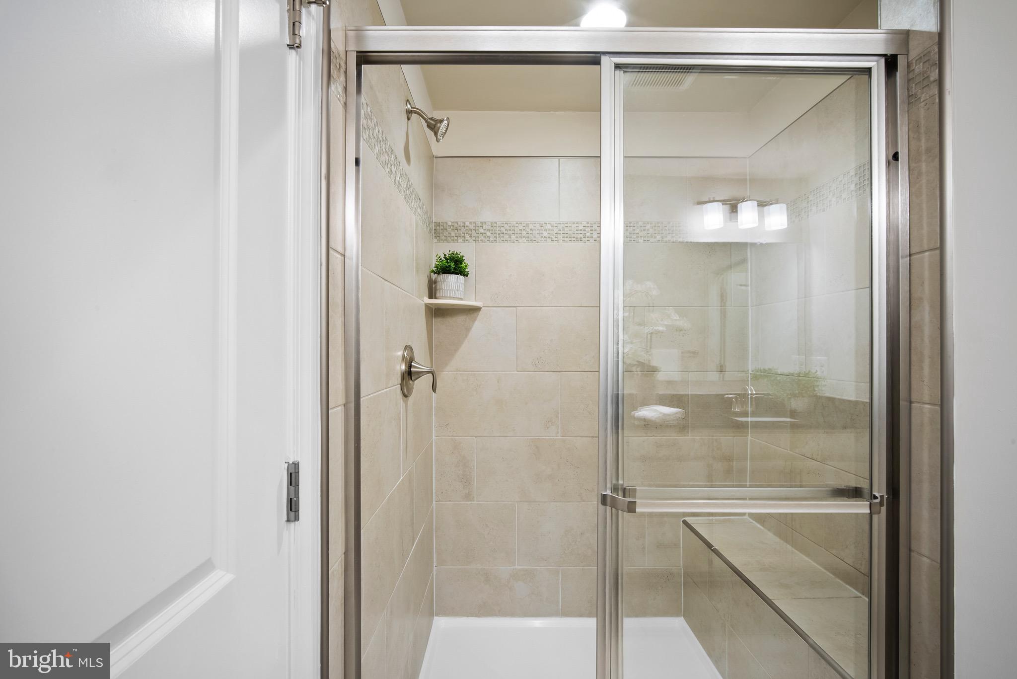 7012 Rackham Way Hanover, MD 21076 - Photo 17 of 46 Tiled Owner's Shower.