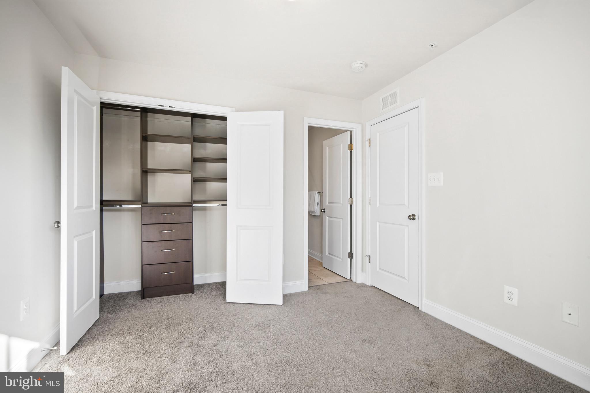 7012 Rackham Way Hanover, MD 21076 - Photo 19 of 46 Bedroom 2 | Attached Bathroom | Custom Closet.
