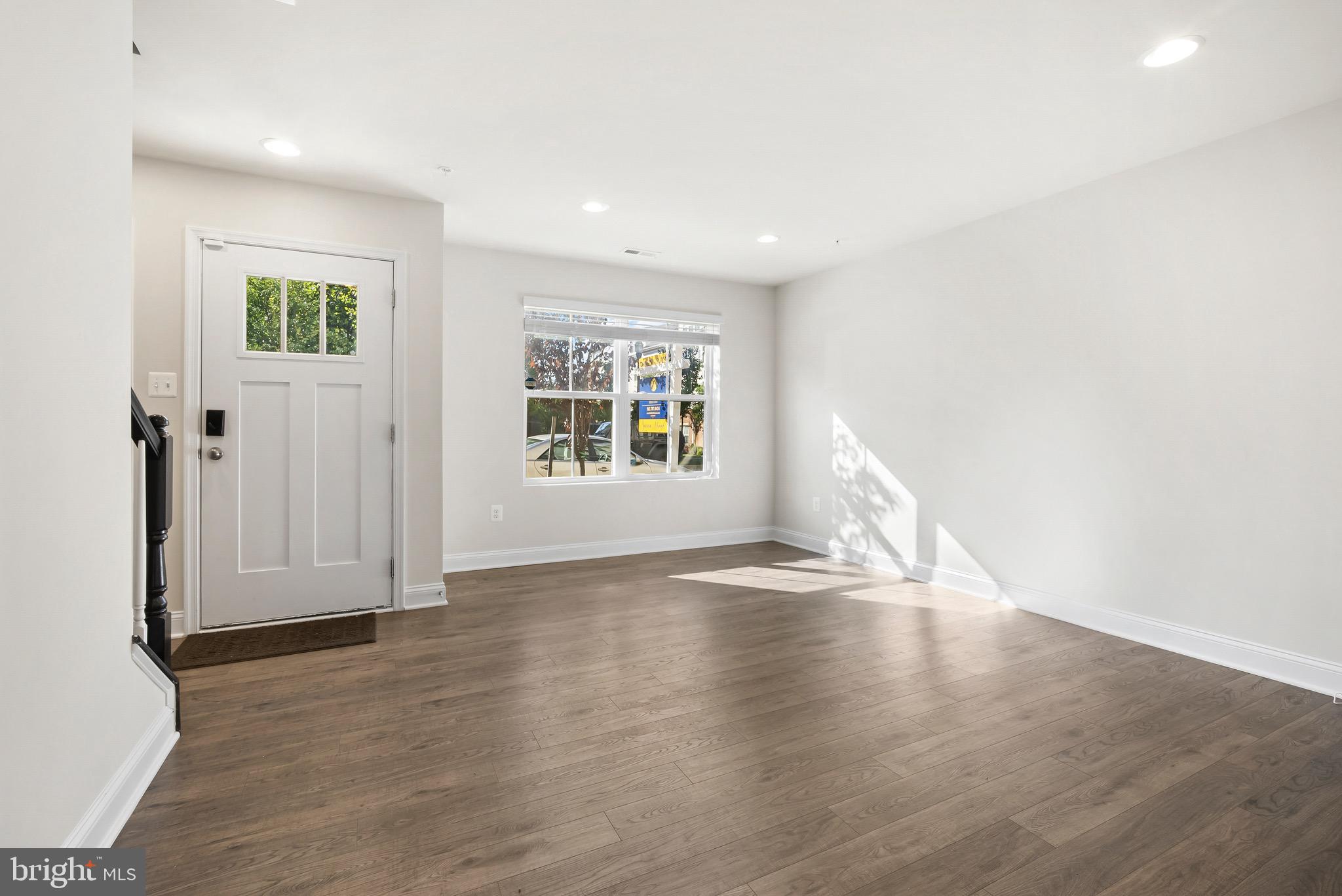 7012 Rackham Way Hanover, MD 21076 - Photo 30 of 46 Lower Level Recreational Area | Foyer Entry.