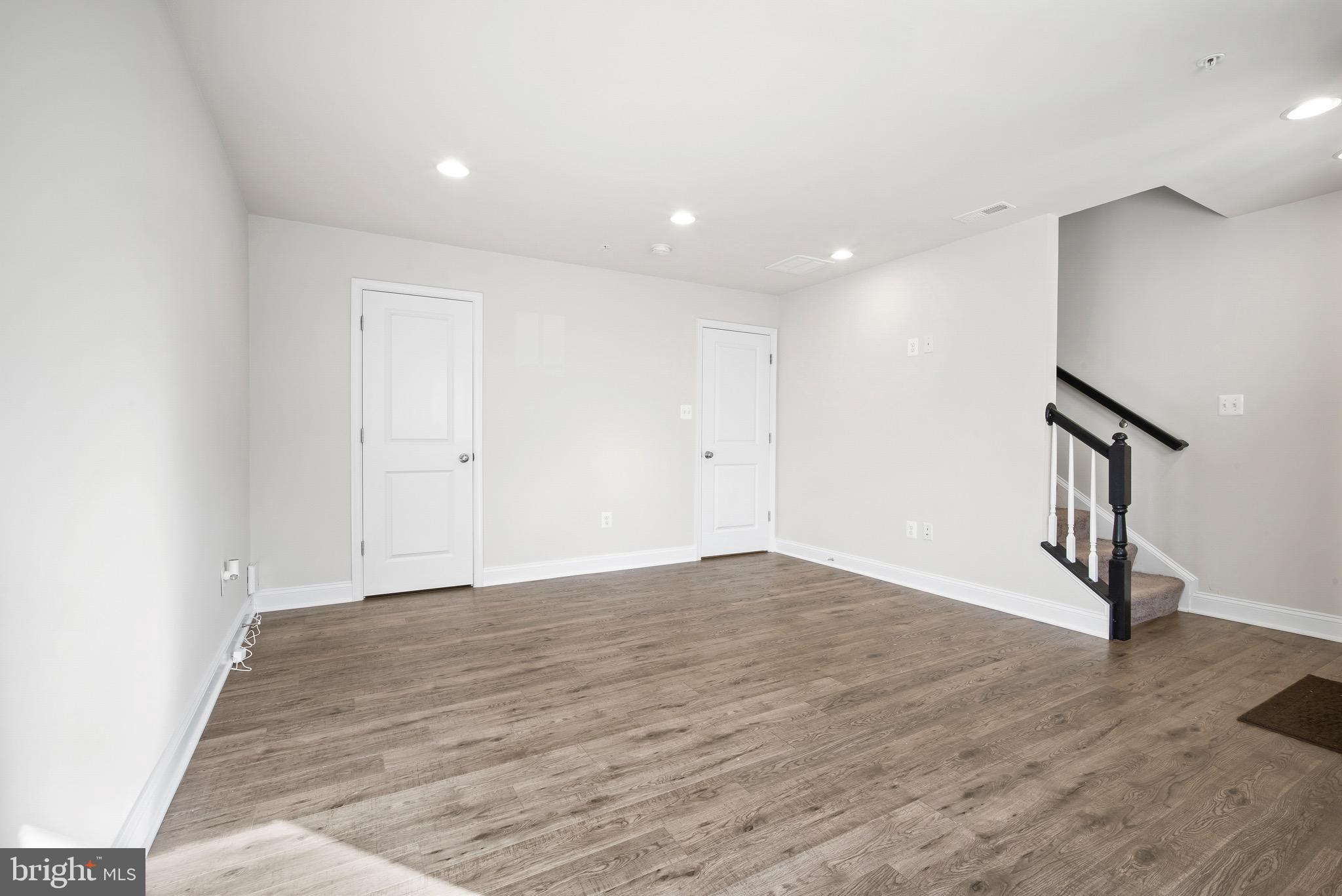 7012 Rackham Way Hanover, MD 21076 - Photo 31 of 46 Lower Level Recreational Area | Foyer Entry.