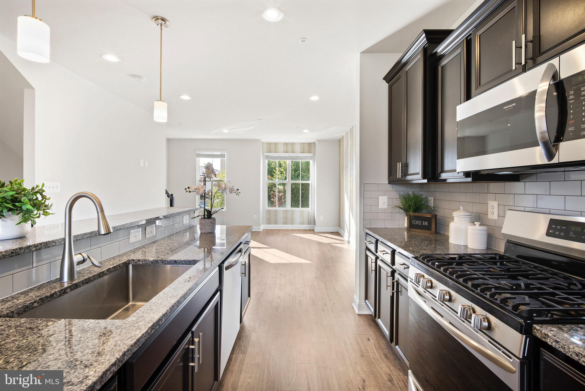 7012 Rackham Way Hanover, MD 21076 - Photo 7 of 46 Massive Island | Pendant Lights | Hardwood.