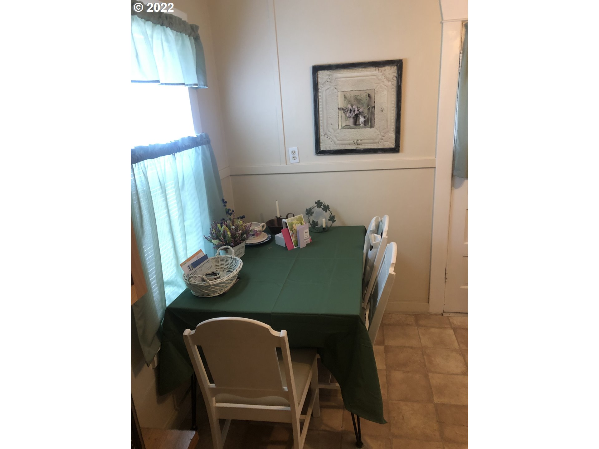 512 Southwest 9th Street Pendleton, OR 97801 - Photo 11 of 19 a view of a dining room with furniture and window