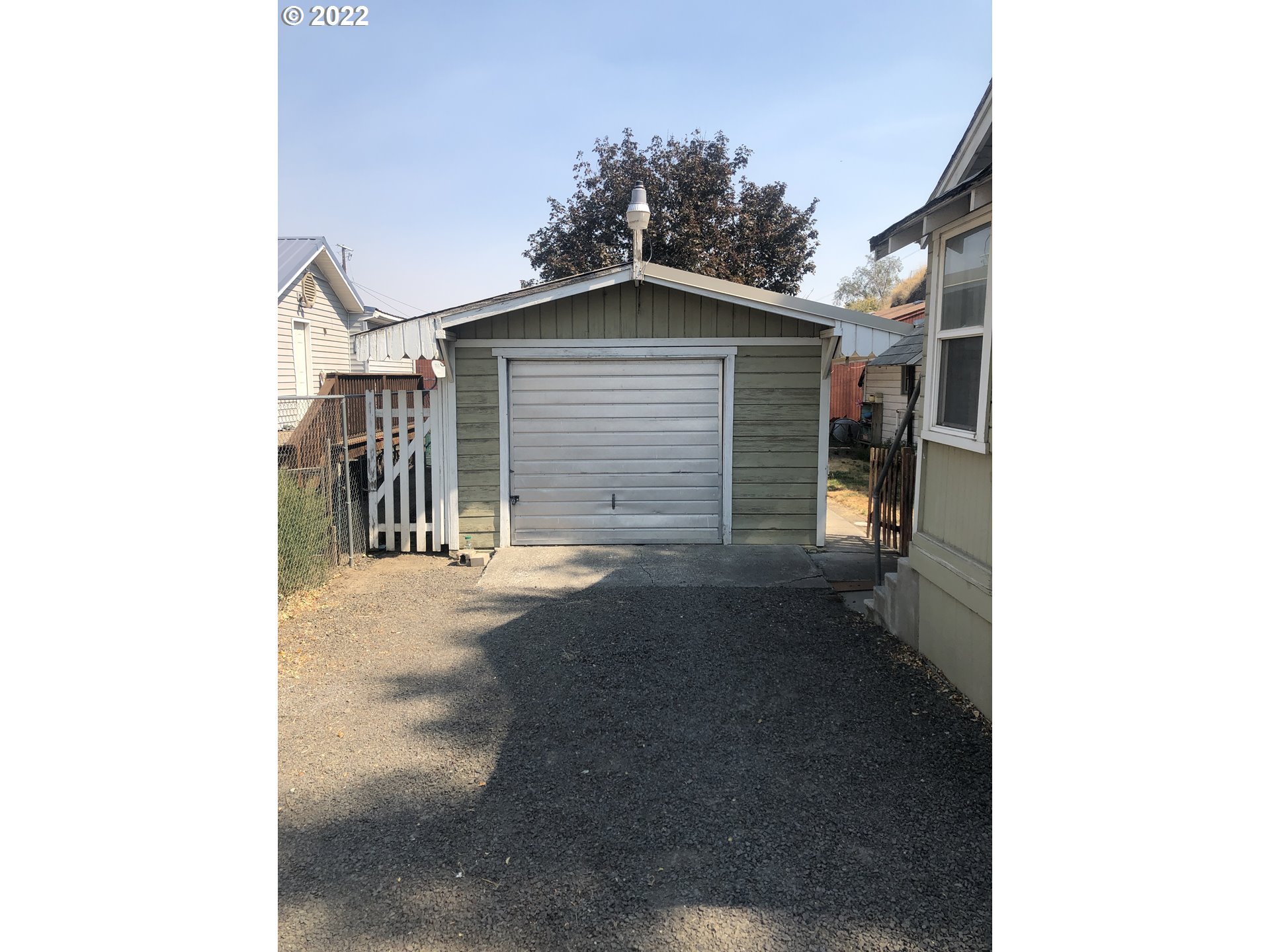 512 Southwest 9th Street Pendleton, OR 97801 - Photo 2 of 19 a view of a house with a garage