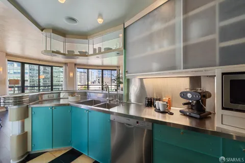 a kitchen with lots of counter space and a sink