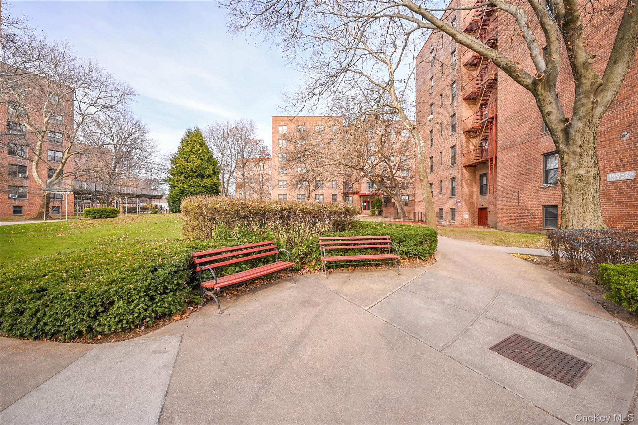 150-30 71st Avenue, Unit 2F Queens, NY 11367 - Photo 17 of 19 Surrounding community with a lawn