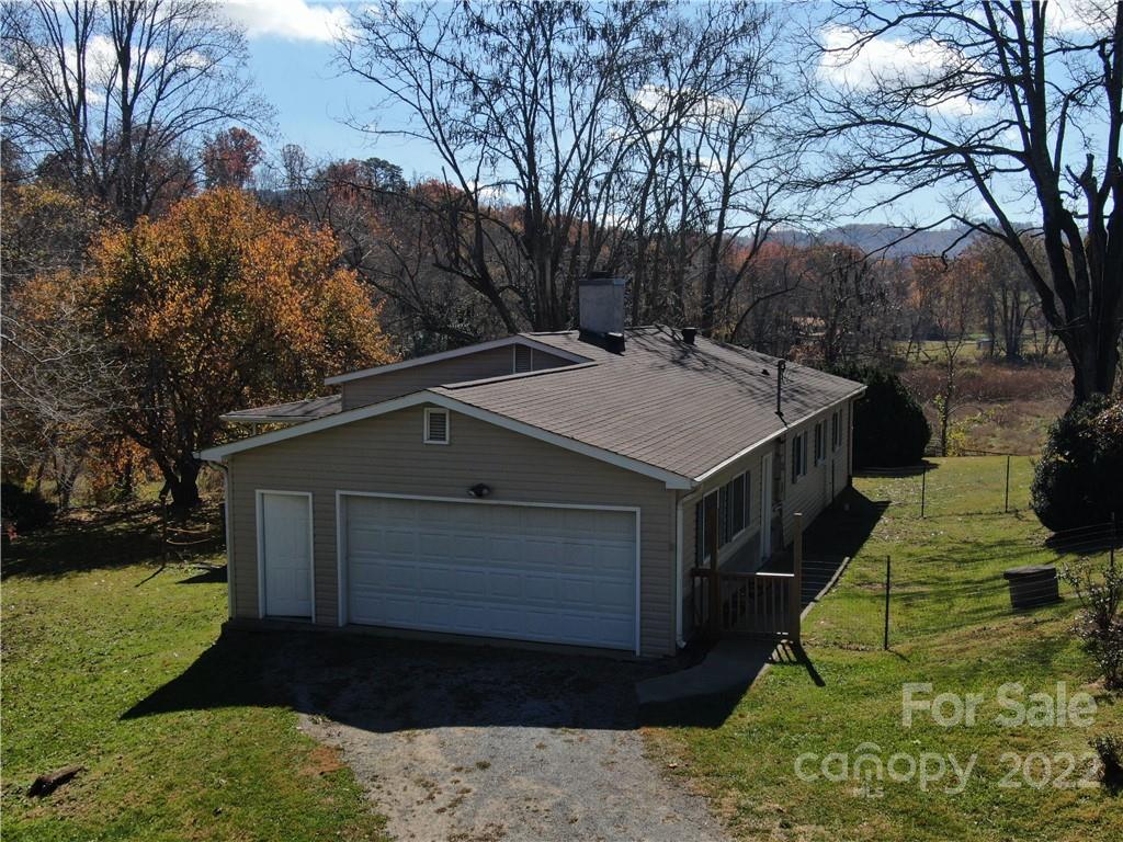 1990 Cane Creek Road Fletcher, NC 28732 - Photo 6 of 22 a view of backyard with green space