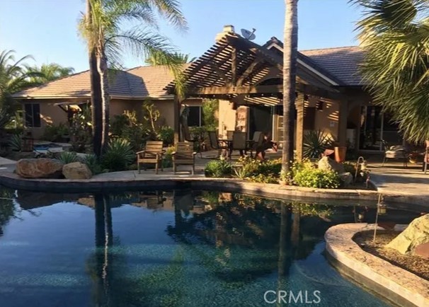 4937 Sweetgrass Lane Bonsall, CA 92003 - Photo 1 of 33 a view of a chairs and table in patio
