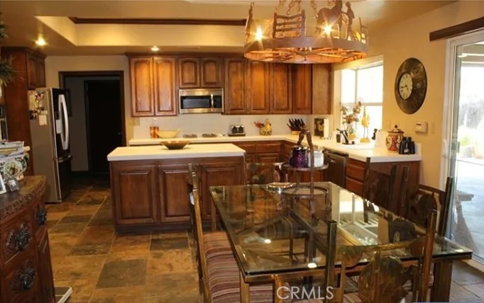 4937 Sweetgrass Lane Bonsall, CA 92003 - Photo 12 of 33 a view of a dining area with furniture