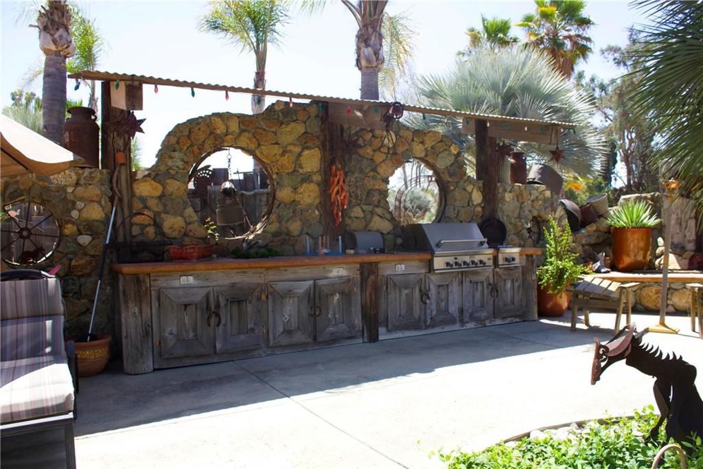 4937 Sweetgrass Lane Bonsall, CA 92003 - Photo 3 of 33 a view of a swimming pool with a patio