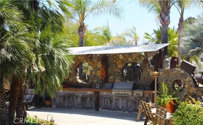 4937 Sweetgrass Lane Bonsall, CA 92003 - Photo 4 of 33 a street view with tall buildings