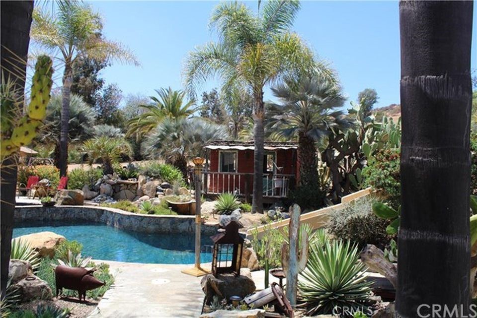 4937 Sweetgrass Lane Bonsall, CA 92003 - Photo 5 of 33 a view of a lake with a patio