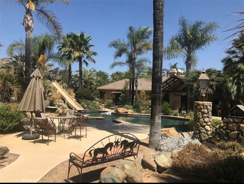 4937 Sweetgrass Lane Bonsall, CA 92003 - Photo 6 of 33 a view of a swimming pool with a patio