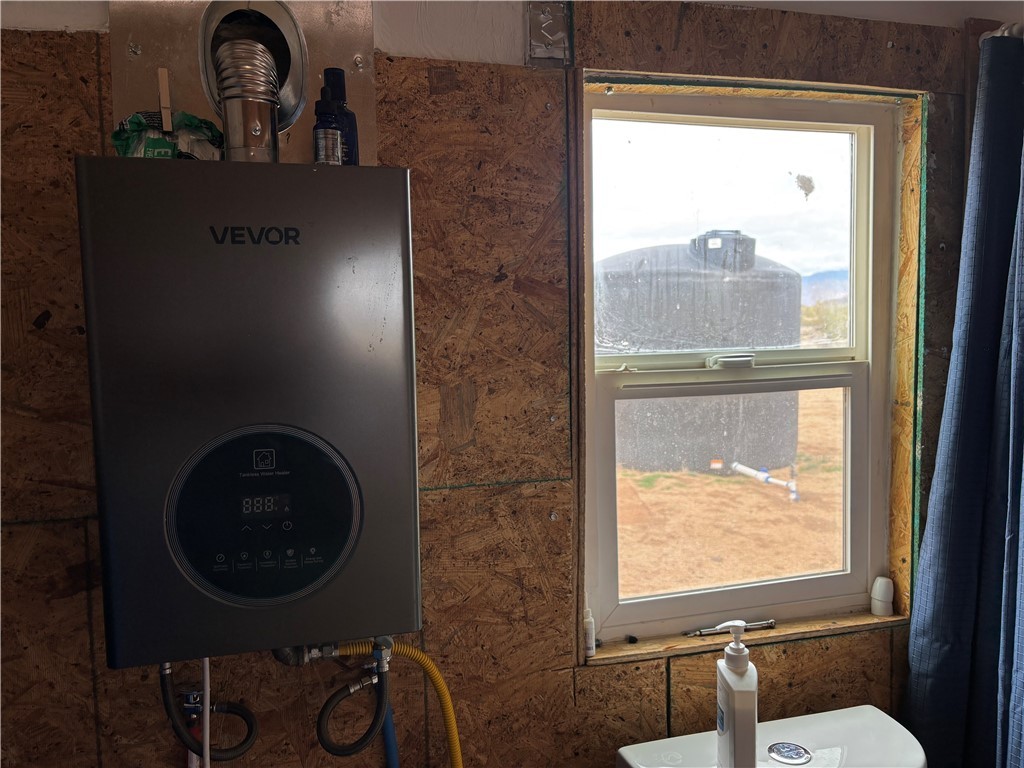 0 South Lone Ranger Road Yucca, AZ 86438 - Photo 29 of 46 instant hot water heater in garage brand new
