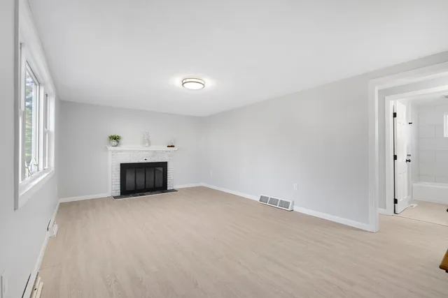 an empty room with windows