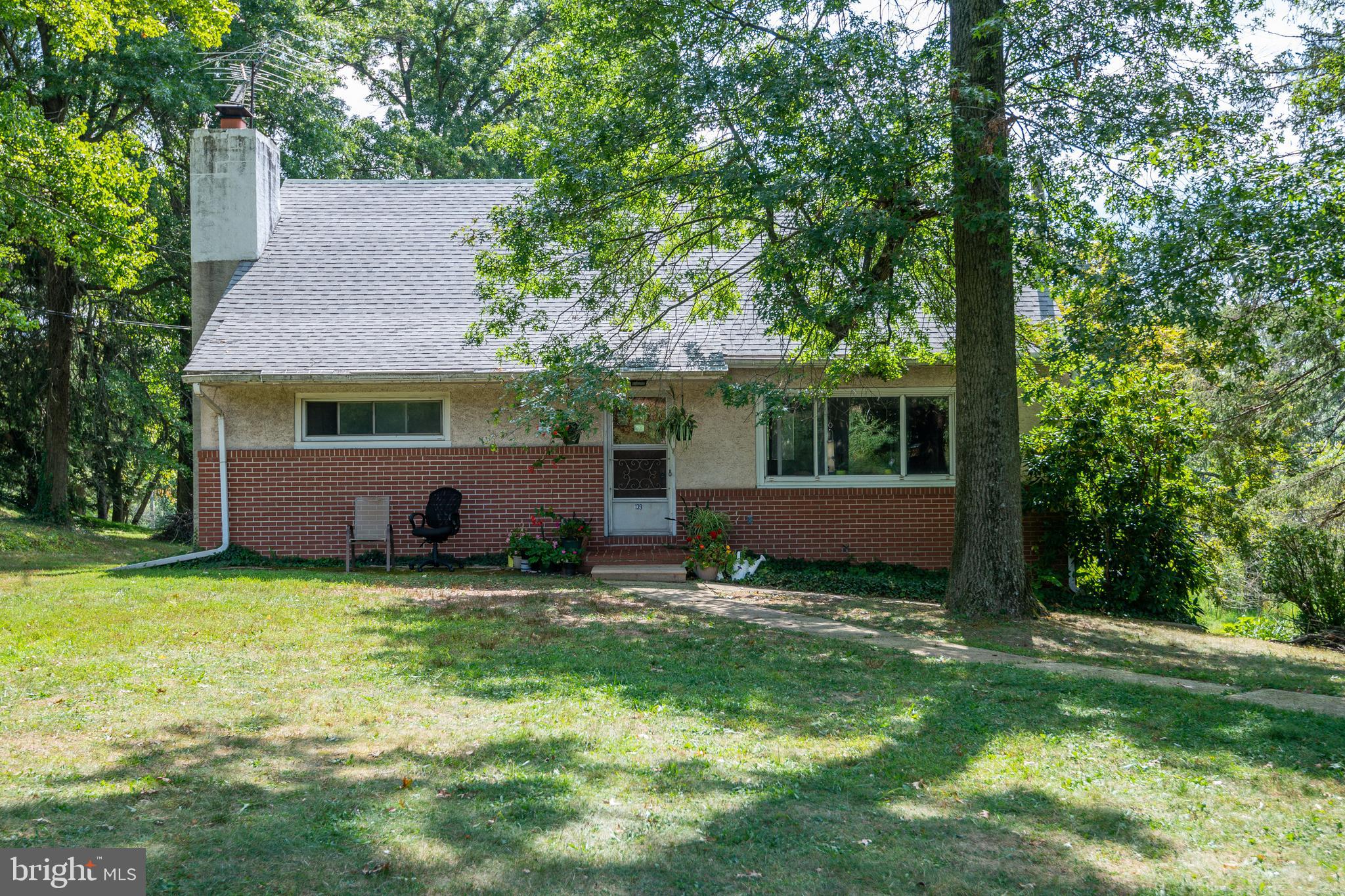 139 Baptist Church Road Spring City, PA 19475 - Photo 1 of 32 a view of a house with a yard and a tree
