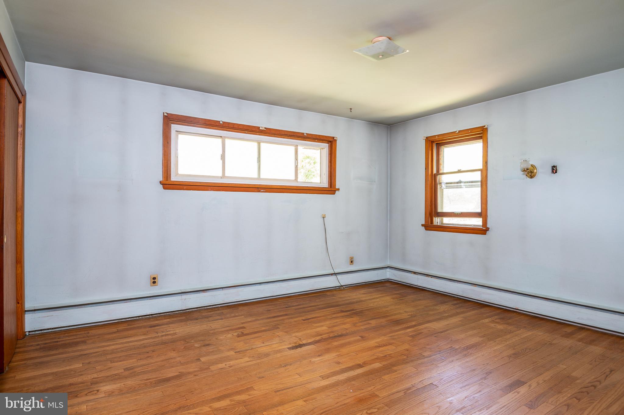 139 Baptist Church Road Spring City, PA 19475 - Photo 22 of 32 a view of a room with wooden floor and window