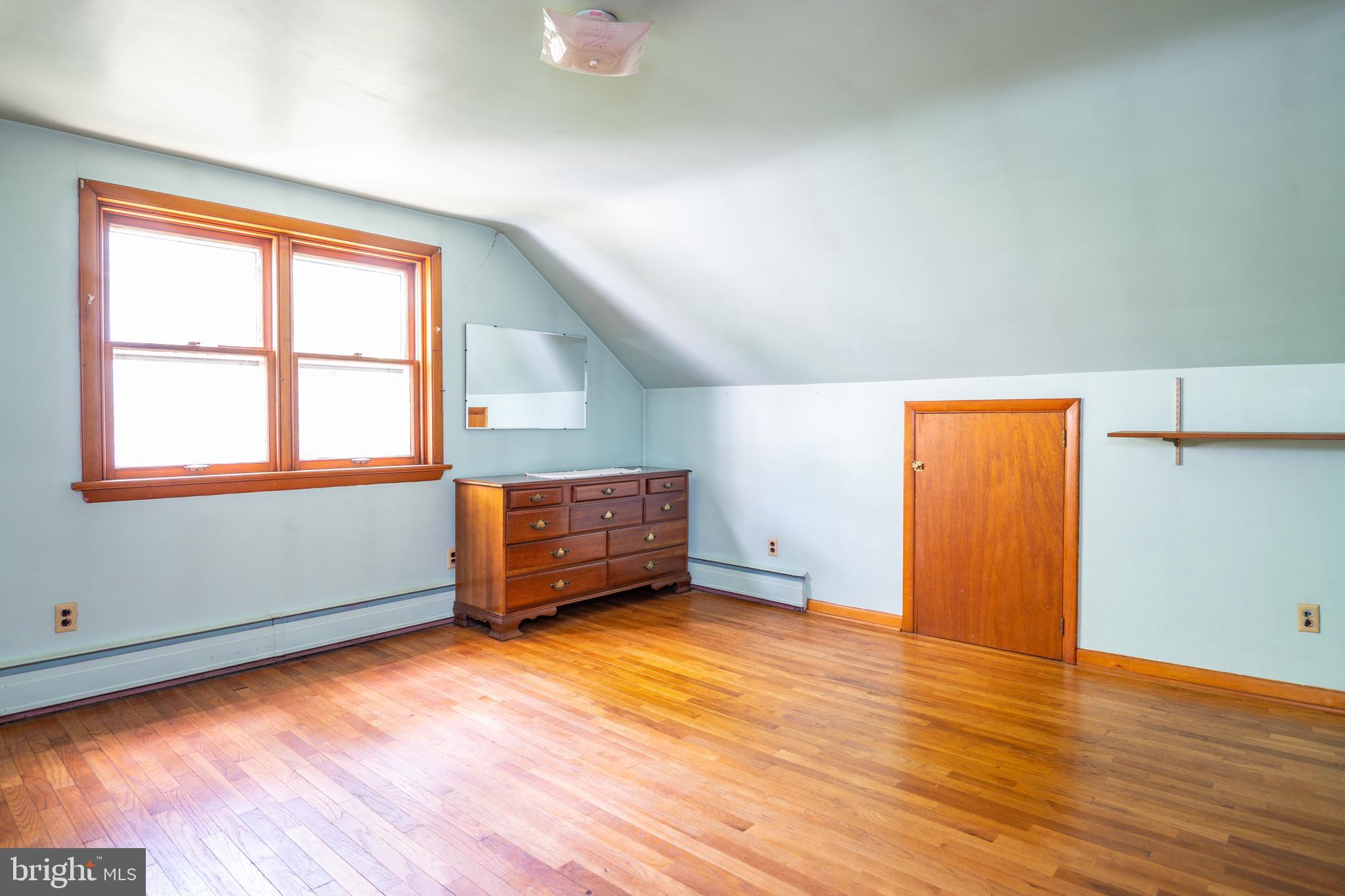 139 Baptist Church Road Spring City, PA 19475 - Photo 27 of 32 an empty room with wooden floor and windows