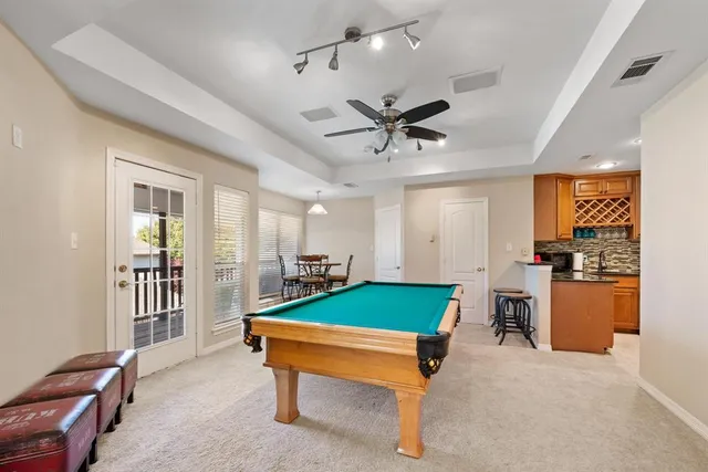 a living room with furniture and a table