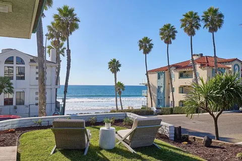 a view of an ocean with outdoor seating