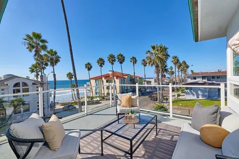 a view of a swimming pool with a lounge chair