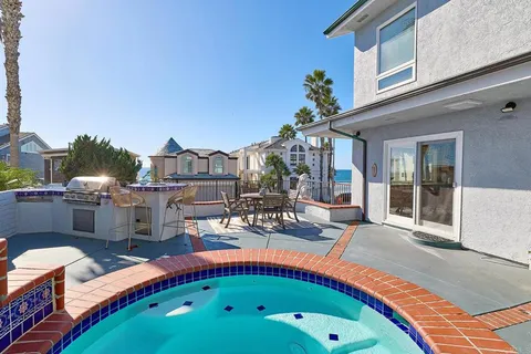 a front view of a house with swimming pool