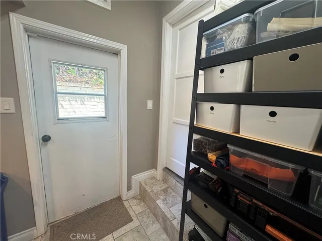 a room with storage and utility