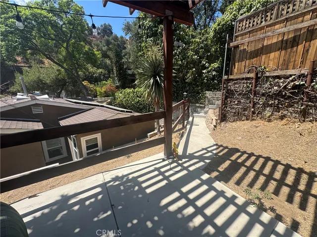 a view of a street with some trees