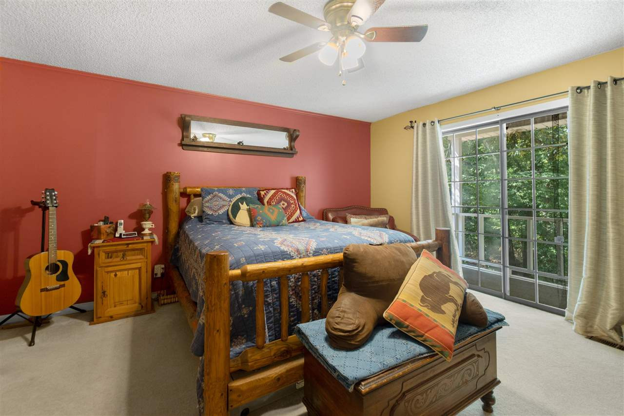 4840 Clifford Road Luray, TN 38352 - Photo 12 of 23 a bedroom with furniture and a window