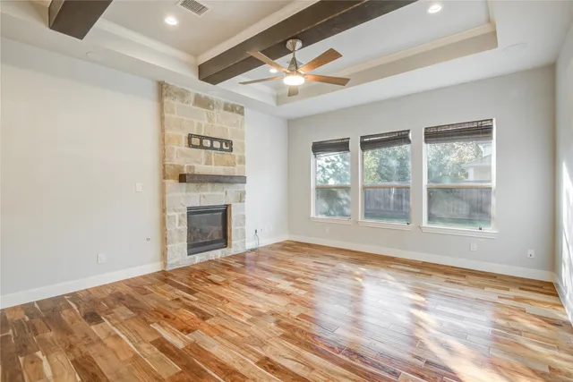 a view of a kitchen with wooden floor