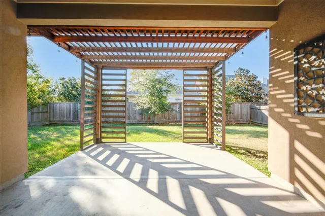 a front view of a house with a large window