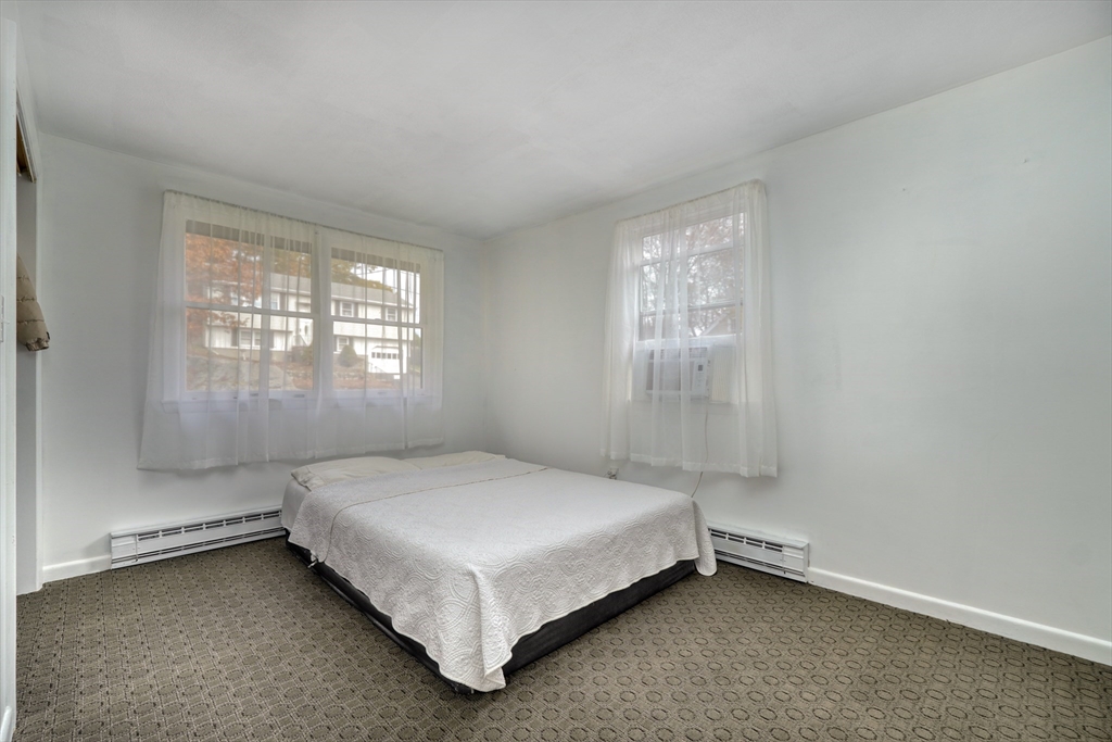 38 Appleton Street Saugus, MA 01906 - Photo 19 of 38 a bedroom with a bed and window