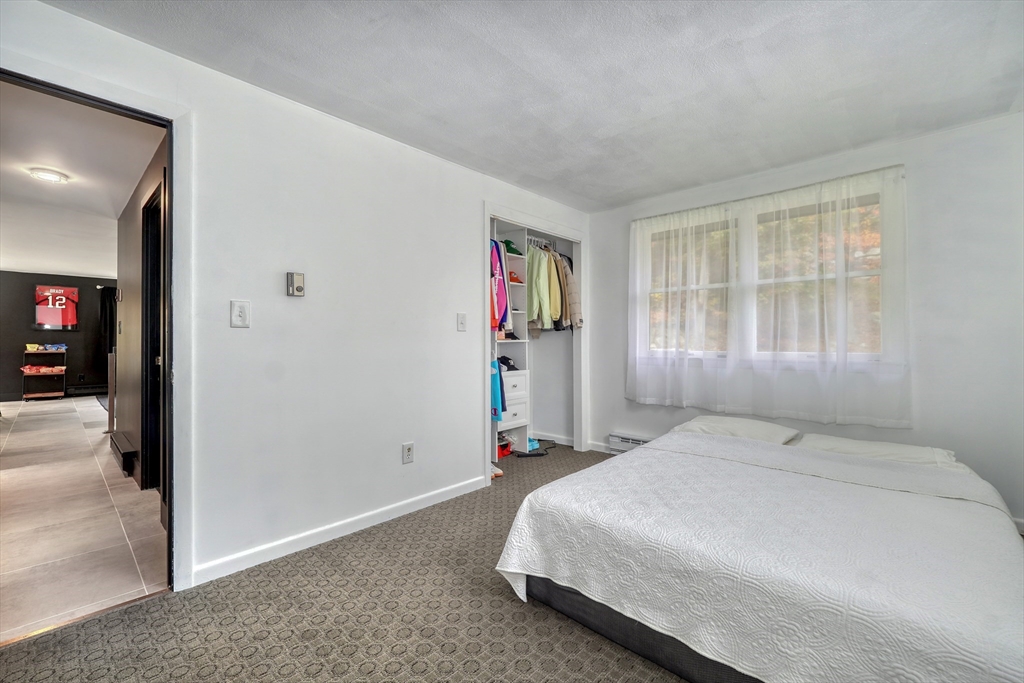38 Appleton Street Saugus, MA 01906 - Photo 20 of 38 a bedroom with a large bed and a window