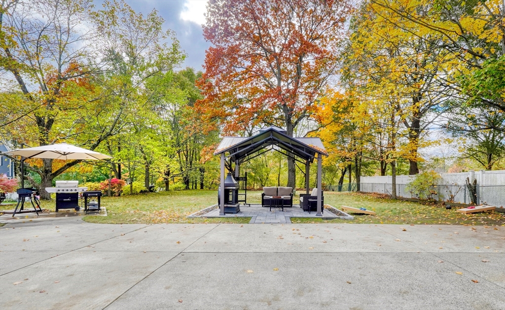 38 Appleton Street Saugus, MA 01906 - Photo 31 of 38 a view of a house with a yard and large trees